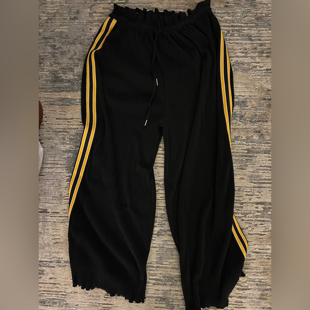 Black Pants with Yellow Stripes